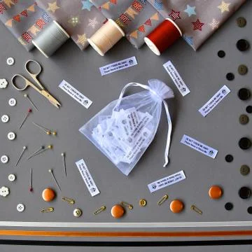 Sewing accessories flat lay. Stock Photos