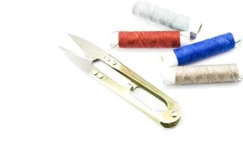 Sewing accessories on white background Stock Photos