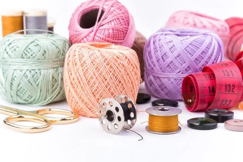 Sewing accessories on white background Stock Photos