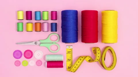 Sewing and knitting items layout move on pastel pink background. Stop motion Stock Footage 154962231