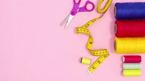 Sewing and knitting items ordering on right side. Stop motion Stock Footage 154962973