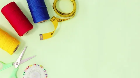 Sewing and knitting threads. buttons scissors and other items appear Stop motion Stock Footage 154971218