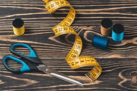 Sewing background with color threads, meter and scissors Stock Photos
