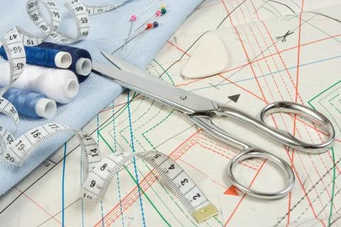Sewing background with scissors Stock Photos