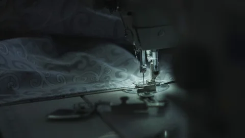 Sewing bed linen on a sewing machine Video stock 91662180
