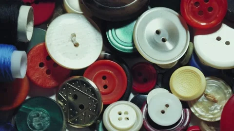 Sewing buttons. close-up. rotation. Various round colored sewing buttons rotate Video stock 154429827