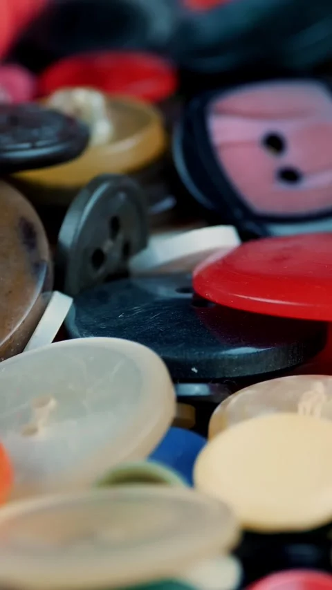 Sewing buttons. close-up. rotation. Various round colored sewing buttons rotate Stock Footage 319104029