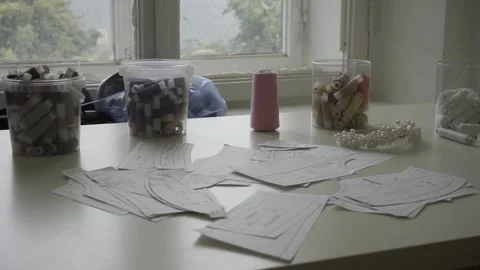 Sewing clippings and spools of thread Stock Footage 159881508