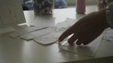 Sewing clippings and spools of thread Stock Footage 159881556