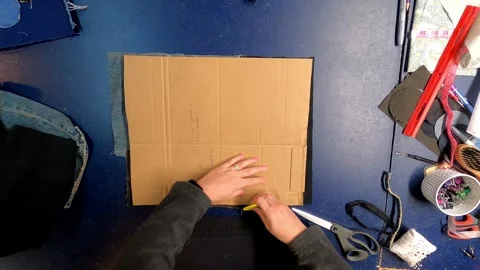 Sewing Cloth thread sewing machine scissors cutting creating Stock Footage 320035992