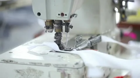Sewing clothes with machine in factory Stock Footage 22152610
