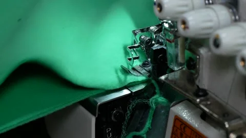 Sewing clothes on a sewing machine close-up. Stock Footage 197552414