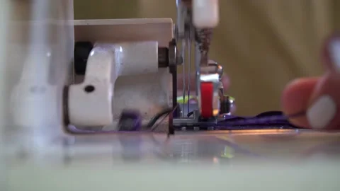 Sewing clothes. The work of the sewing machine. Close-up. Video stock 195089676