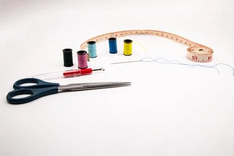 Sewing essentials on a white background Stock Photos