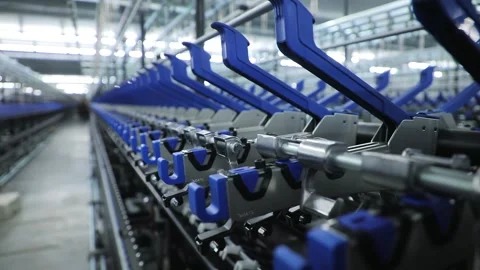 Sewing factory, blue elements, thread holders, hooks Stock Footage 208106898
