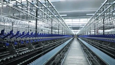 Sewing factory, blue elements, thread holders, hooks, row, pan Stock Footage 208107750