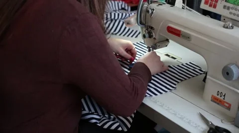 Sewing factory. Sewing machine. Stockbeeldmateriaal 48790833