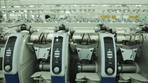 Sewing factory, winding machine row, pan Stock Footage 208107890