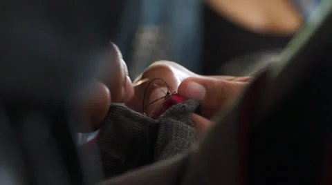 Sewing by hand closeup Stockbeeldmateriaal 32629118