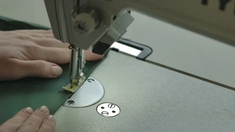 Sewing hands close up over shoulder Видео 146364031