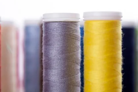 Sewing instruments, threads, needles, bobbins and materials. Stock Photos