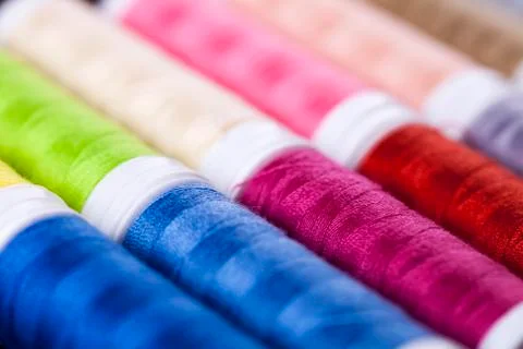 Sewing instruments, threads, needles, bobbins and materials. Stock Photos