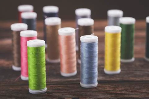 Sewing instruments, threads, needles, bobbins and materials. Stock Photos