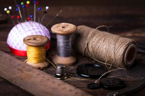Sewing instruments, threads, needles in vintaae style Stock Photos