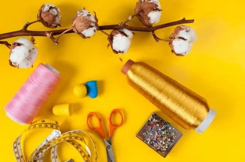 Sewing items with cotton bolls Stock Photos
