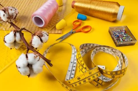Sewing items with flower cotton Stock-Fotos