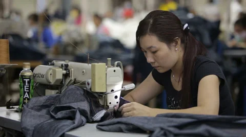 Sewing Jeans Stock Footage 33799589