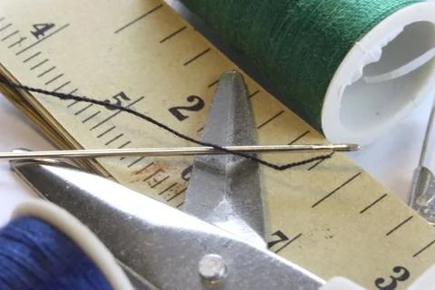 Sewing kit with threaded needle Stock Photos