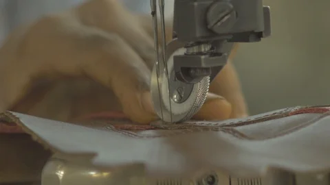 Sewing a leather Stock Footage 107967942