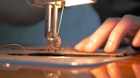 Sewing the leather with thread on the sewing machine, dolly, close up 4k Stock Footage 61158643