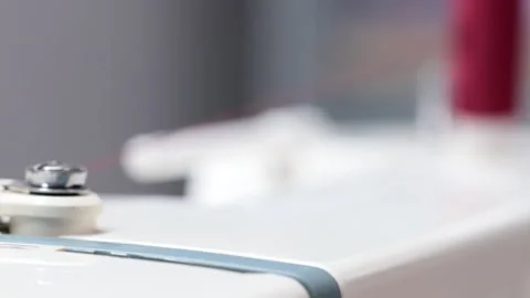 Sewing Machine in Action with Visible Moving Metal Part Stock Footage 306738788