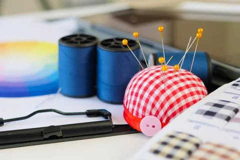 Sewing machine and accessories on table at dressmaking workshop, Dressmaker Stock Photos