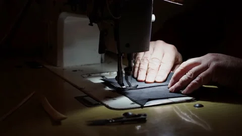 Sewing machine and men's hands of a tailor Stock Footage 150793317