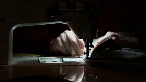Sewing machine and men's hands of a tailor Stock Footage 150793499