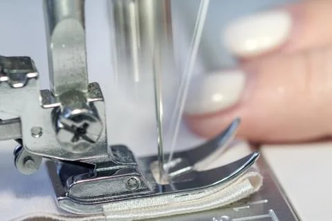 Sewing machine and the needle Photos