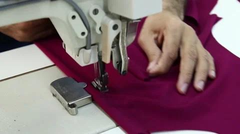 Sewing machine and tailor Stock Footage 64359892