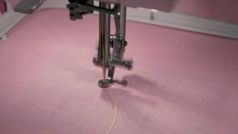 Sewing machine. An automated sewing machine sews a star. Stock Footage 155817377