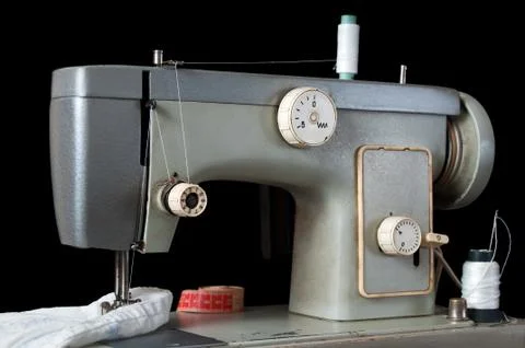 Sewing machine on black background Stock Photos