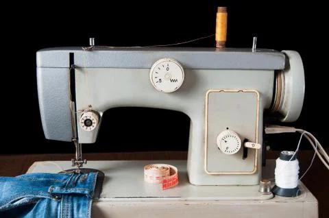 Sewing machine on black background Foto stock