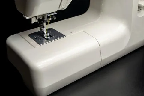 Sewing machine on a black background 스톡 사진