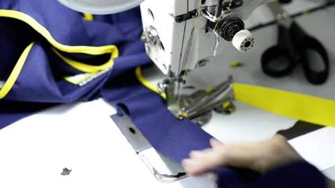 Sewing machine close up macro stitching clothes Video stock 172565972