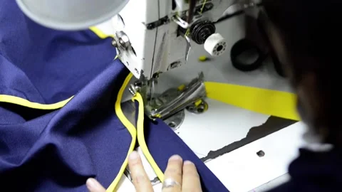 Sewing machine close up macro stitching clothes Stock-Footage 172565973