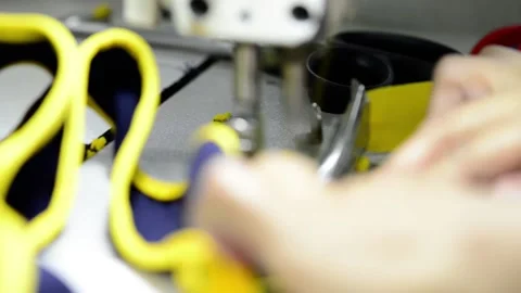 Sewing machine close up macro stitching clothes Video stock 172566042