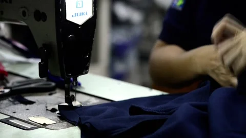 Sewing machine close up macro stitching clothes Video stock 172566269