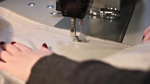 Sewing machine close up sewing curtains. Stock Footage 46015702