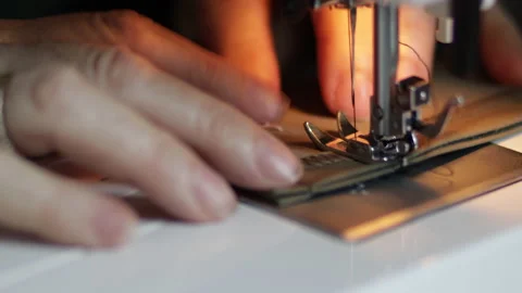 Sewing machine on clothes and material. Tailor at work. Close up. Art of sewing Video stock 135139617